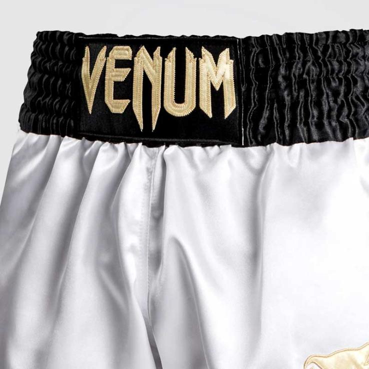 Calça Venum Classic Muay Thai preta/branca/dourada